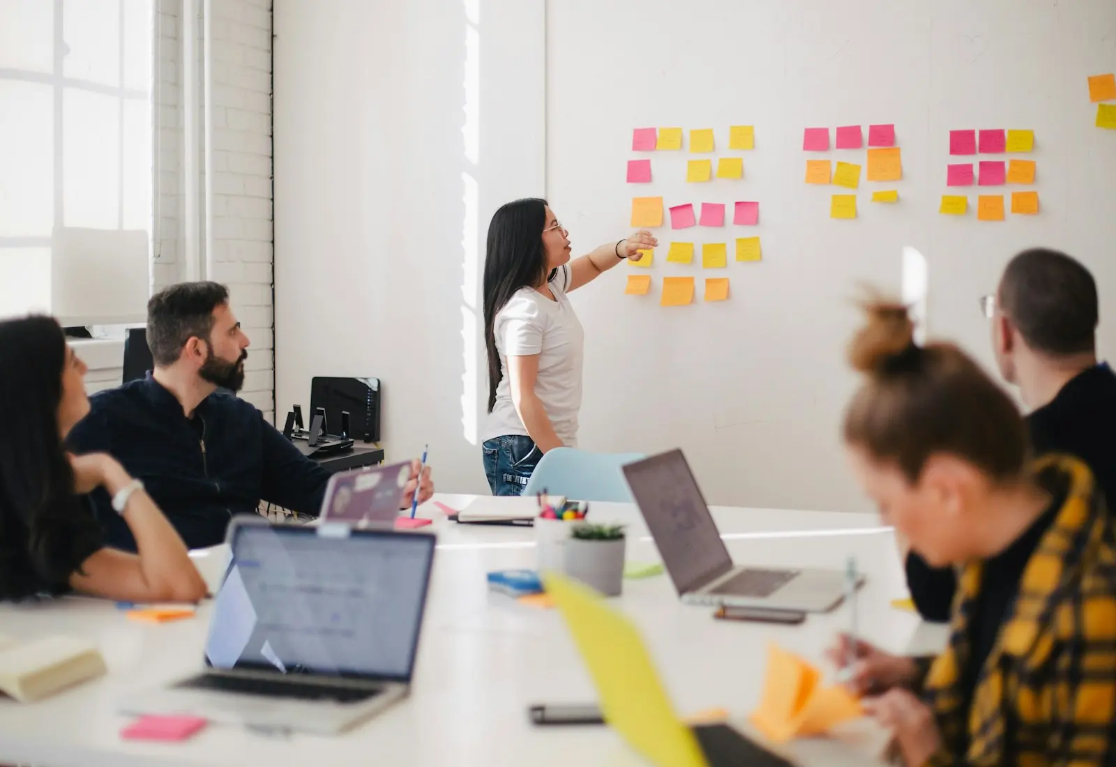 A team in a working session around a conference table